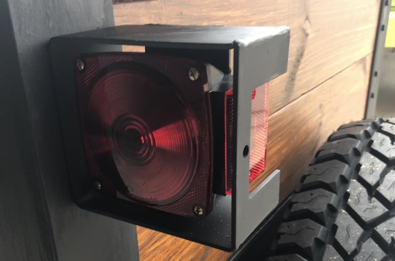 A taillight protector on an off road trailer.