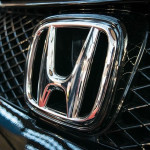 A Honda logo from a Passport.