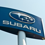 A sign for a subaru outback dealer