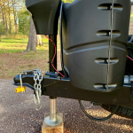 A camping trailer with a hitch lock.